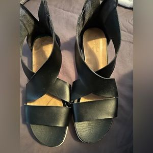 Woman’s size 8.5 black leather sandals